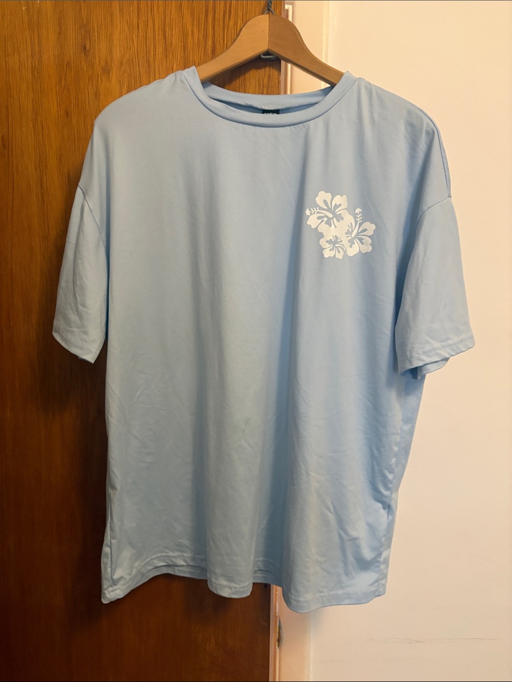 SHEIN Light Blue Short Sleeve Tee with White Floral Graphic